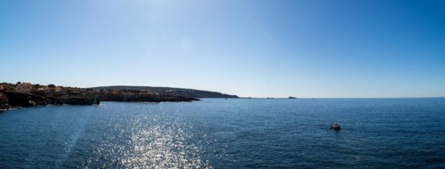 View of the sea with fishing boat from the Mirador de les Malgrats near Santa Ponca or Santa Ponsa,