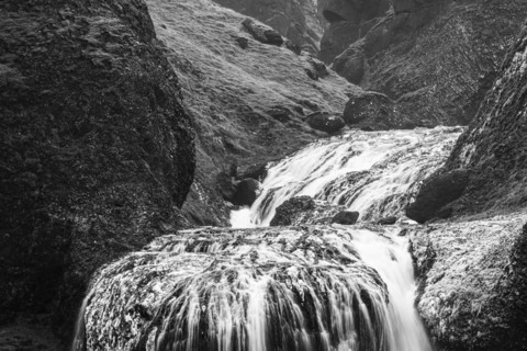 Stjornarfoss waterfall, near Kirkjubaejarklaustur, black and white photo, Sudurland, Iceland,