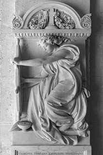 Sculpture of a woman with a ship's steering wheel, Monumental Cemetery, Cimitero monumentale di
