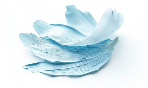 A light blue brush stroke forming a chamomile petal. Chamomile flower painted on white background