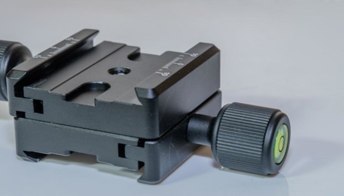 Closeup of lock type camera mount for use on tripod