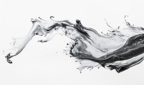 A brush glides across a white canvas. Black, gray and white dramatic strokes. Abstract background