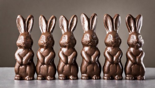 Six brown chocolate bunnies lined up in a row, Easter symbol, AI generated, AI generated