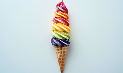 Rainbow-colored ice cream cone on white background AI generated