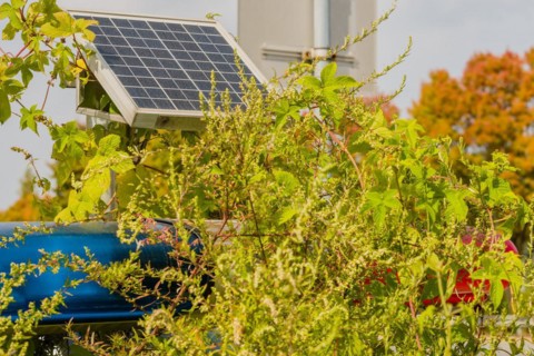 Closeup of small solar panel attached to metal support frame used to power police lights hidden by