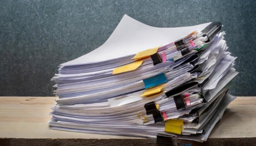A confusing pile of documents and files with labels on a desk, symbol bureaucracy, AI generated, AI