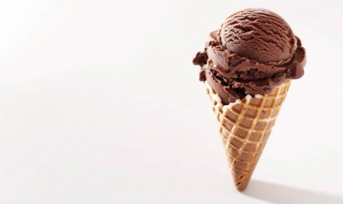 Chocolate ice cream cone on white background AI generated
