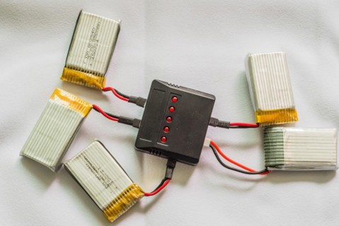 A USB hub connected to multiple lithium polymer batteries for charging, in South Korea