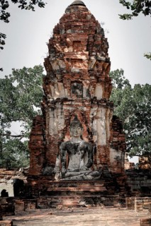Ancient temple ruins in Wat Choeng Tha, part of the famous Ayutthaya Historical Park in Thailand.