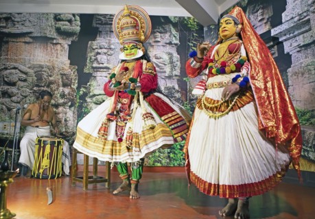 Kathakali performer or mime, 38 and 60 years old, and drummer on stage at the Kochi Kathakali