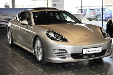 Silver Porsche Panamera in a showroom of a car dealership, Schwaebisch Gmuend, Baden-Wuerttemberg,