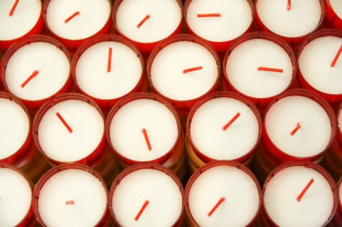 Church of Notre-Dame de la Garde, Marseille, Several white candles in red containers form an