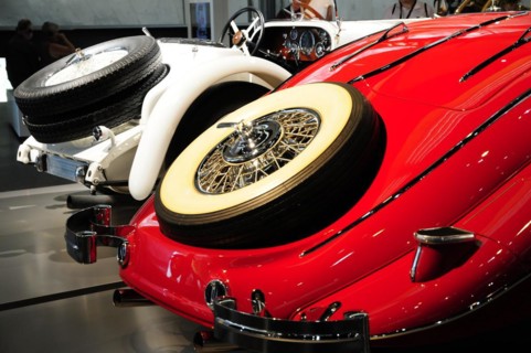 Museum, Mercedes-Benz Museum, Stuttgart, Side view of a red and white classic car with distinctive