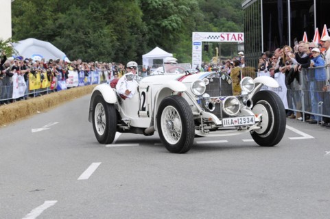 Mercedes-Benz SSK, built in 1928, A white vintage racing car with the number 12 on a race track,