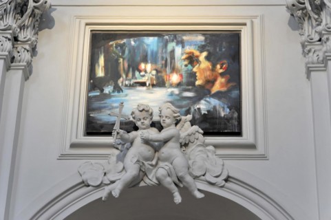 The Neumuenster Collegiate Abbey, Diocese of Wuerzburg, Two statues of angels with an abstract
