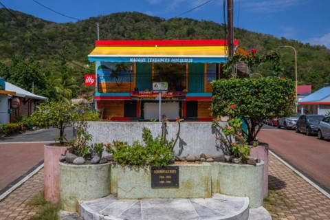 Deshaies, historic Caribbean wooden building of a street in Guadeloupe, Caribbean, French Antilles