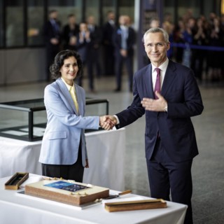 (L-R) Hadja Lahbib, Foreign Minister of Belgium, and Jens Stoltenberg, Secretary General of the