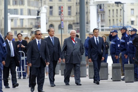 Marseille City Hall, A group of people in official dress walk past police officers, Marseille,