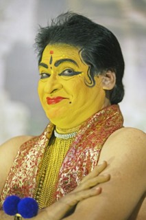 Kathakali performer or mime, 60 years old, with painted face, Kochi Kathakali Centre, Kochi,