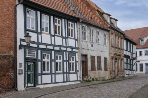 Partly dilapidated houses in Muehlenstrasse, Havelberg, Saxony-Anhalt, Germany, Europe