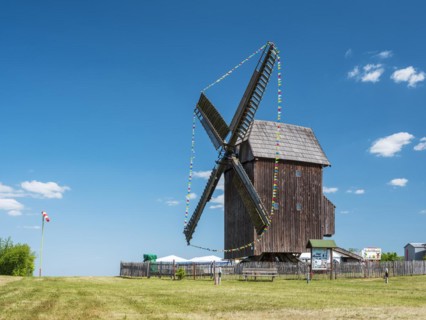 Zwochau mill, trestle windmill, windmill decorated with pennants for Mill Day, Zwochau, Saxony,
