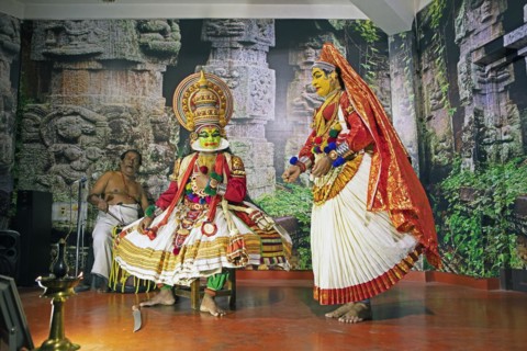 Kathakali performer or mime, 38 and 60 years old, and drummer on stage at the Kochi Kathakali