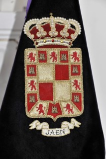 Castillo de Santa Catalina on Jaen, Detailed embroidery of a coat of arms with golden decoration on