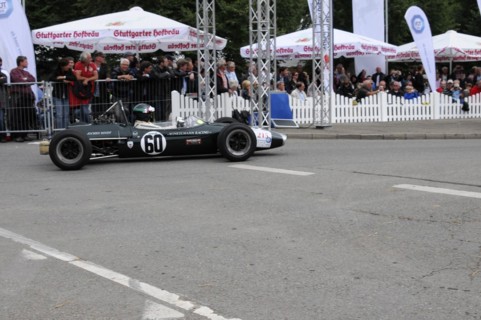 A classic black formula racing car with number 60 surrounded by spectators, SOLITUDE REVIVAL 2011,