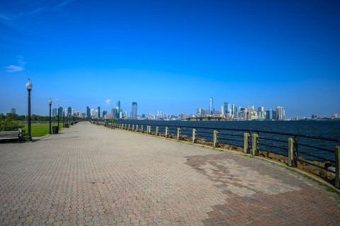Views on New York Harbor, Manhattan and Statue of Liberty from the Liberty State Park, Jersey City,