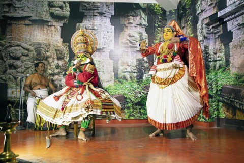 Kathakali performer or mime, 38 and 60 years old, and drummer on stage at the Kochi Kathakali