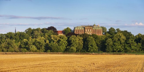 View over stubble field to Burgscheidungen Castle in the evening light, Unstruttal,