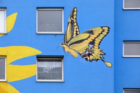 Sunflower house, painted swallowtail butterfly on a skyscraper, artist Ulrich Allgaier, Wuppertal,
