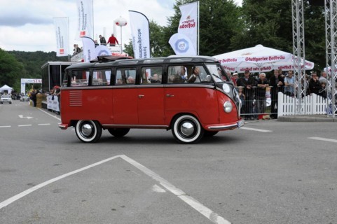VW Samba Bus, built in 1953, side view of a classic red VW bus at an event, SOLITUDE REVIVAL 2011,