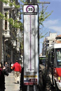 Granada, bus stop sign with the number 35 and a list of bus stops in an urban context, Granada,