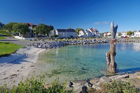 Crystal clear water in a shallow bay, sandy beach, Traena, Lovunden, Helgeland coast, Norway,