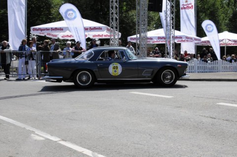 A dark blue Lancia vintage coupe on a race track in front of an audience, SOLITUDE REVIVAL 2011,