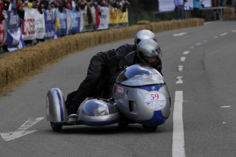 Motorbike with sidecar leaning in a curve, rider focussed, SOLITUDE REVIVAL 2011, Stuttgart,