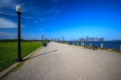 Views on New York Harbor, Manhattan and Statue of Liberty from the Liberty State Park, Jersey City,