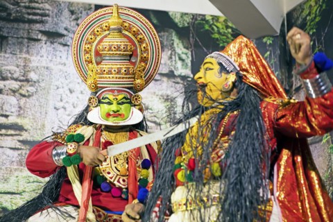 Kathakali performer or mime, 38 and 60 years old, on stage at the Kochi Kathakali Centre, Kochi,