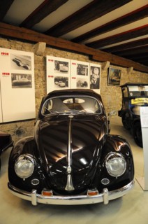 German Car Museum Langenburg, Black Volkswagen Beetle in a historic museum setting, German Car