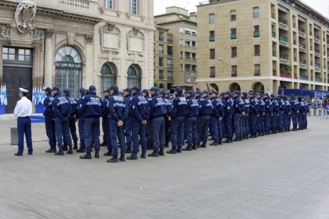 Marseille town hall, policemen in blue uniforms, lined up in a public square, Marseille,