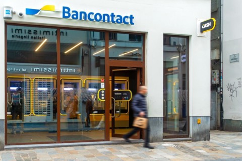 Indoor ATM cash dispenser of bank neutral Bancontact CASH point in shopping street in the city