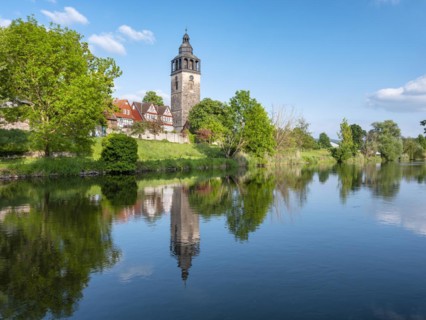 St Crucis Church, half-timbered houses and town wall in the historic old town of Allendorf,
