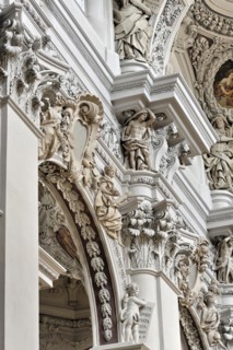 St Stephen's Cathedral, Passau, detail of baroque stucco work with sculptures in a church interior,