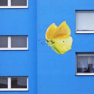 Sunflower house, painted yellow lemon butterfly on a skyscraper, artist Ulrich Allgaier, Wuppertal,