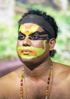 Kathakali performer or mime, 38 years old, with painted face, Kochi Kathakali Centre, Kochi,