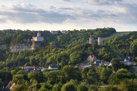View of Rudelsburg castle ruins, Saaleck castle and Kreipitzsch manor, in the Saale valley, near
