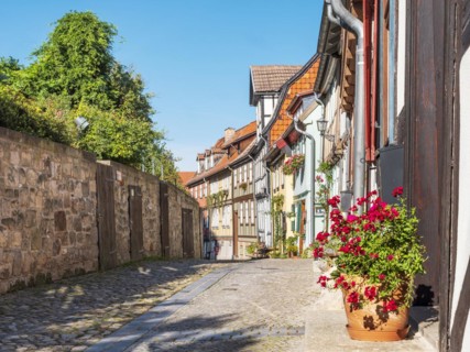 Narrow alley with half-timbered houses and cobblestones on the Schlossberg in the historic old
