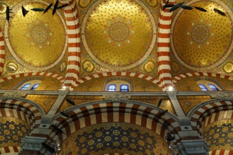 Church of Notre-Dame de la Garde, Marseille, Golden dome inside a church with mosaics and patterns,
