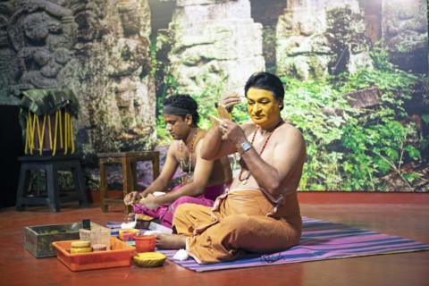 Kathakali performers or mime artists, 38 and 60 years old, make up their faces, Kochi Kathakali